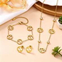 Bộ trang sức chữ lồng 3 món, dây chuyền, vòng tay và bông tai bằng thép không gỉ mạ vàng, đính đá CZ sáng bóng, phong cách sang trọng và tối giản, hoàn hảo cho sử dụng hàng ngày, dự tiệc và làm quà tặng. - Nhiều màu - Xem 1