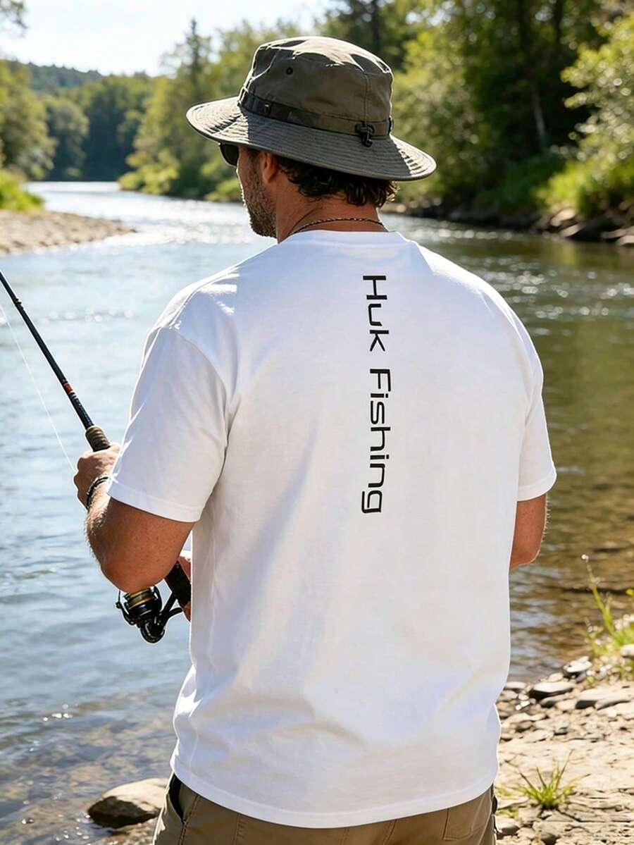 Unisex White Huk Fishing T-Shirt With Black Front Logo And Vertical "Huk Fishing" Back Print, Lightweight Casual Crewneck Tee For Anglers, Perfect For Fishing Trips, Outdoor Activities And Everyday Streetwear. - White - View 1