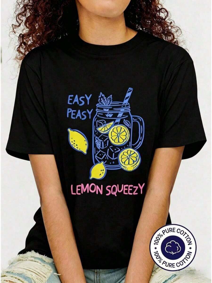 Camiseta "Easy Peasy Lemon Squeezy" - Camiseta con lindo estampado de limones, 100% algodón, estilo casual cómodo, especial de verano, cuello redondo blanco, camiseta de manga corta, ropa para conciertos y festivales 2026 para mujeres. |   Diseño exquisito |   Suelto y cómodo |   Fácil de combinar | - Negro - Ver 1