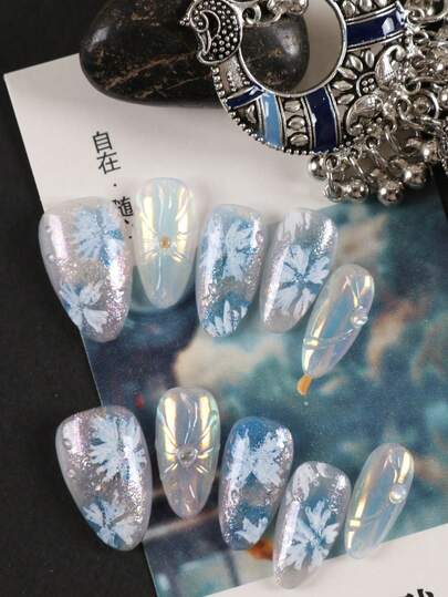 10 piezas Uñas postizas Suministros para uñas postizas Uñas blancas almendradas Uñas azul aurora con flores Uñas postizas cortas Kit de uñas artificiales que incluye 1 hoja de pegatinas adhesivas y 1 lima mini