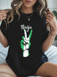 Camiseta de impresión gráfica Naija, manga corta cuello de tripulación Top casual para verano y primavera, ropa de mujer - Negro - Ver 2