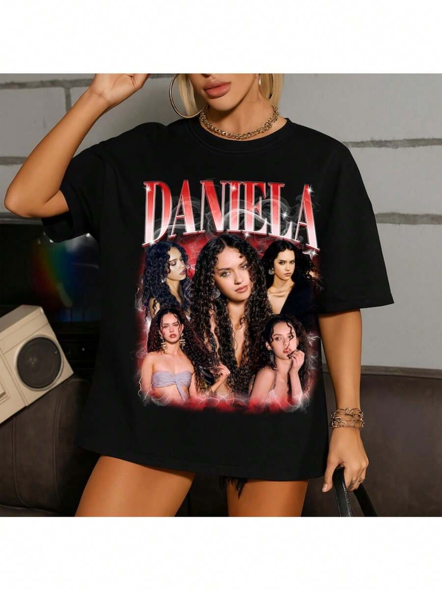 Fashionable Printed Short-Sleeved T-Shirt For Women, With A Multicolored Patchwork Print And The Word "DANIELA" In The Center, Perfect For Everyday Wear. Casual Cotton T-Shirt, Soft, Lightweight And Comfortable. Cotton Daytime Comfort, Stylish And Casual Design. Ideal For Men And Women. Crew Neck T-Shirt, Gym Top, Going Out Top, Outdoor Clothing, Holiday, Graduation, Fitted, Slogan T-Shirt, Quote T-Shirt, Minimalist Graphic T-Shirt, Funny Graphic Tee, Beach Party, Surfing, Picnic, Gift, Airport Outfit, Spring, Coordinates Sets, Women's Summer, Understated Summer Outfits, Summer Coordinates, Event Dresses, Autumn, Winter, All Seasons, Birthday Dress, Party Outfits, Rave Outfit, Office Wear, Women's Curvy, Casual Clothing For Women, Gym Wear, Resort Style, Classic Unisex Graphic T-Shirt T8QU - Black - View 1