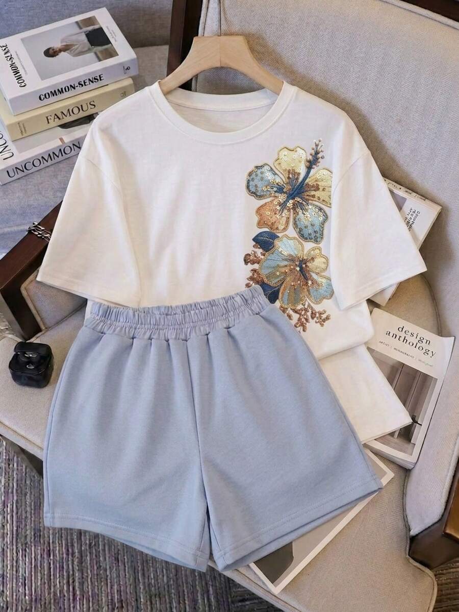 Conjunto set 2 piezas Verano Tropical Bloom Camiseta con estampado artístico & Shorts Soft French Terry ultra comodos ideal estilo casual diario casa pijamada - Celeste - Ver 1