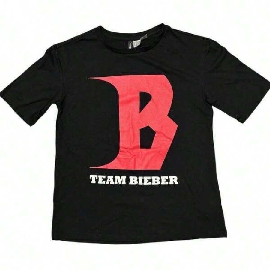 JuTstin BLieber 2000 Vintage Style Merchandise, Summer Concert Outfit For Women, Black Concert Merchandise By .TT Shirt, Band Graphic TT Shirt, Bieber Team TT Shirt, Perfect For Everyday Casual Wear Cotton T-Shirt, Soft, Lightweight And Comfortable Cotton Day Comfort, Stylish Casual Design Ideal For Men And Women, Crew Neck T-Shirt, Gym Top, Going Out Top, Outdoor Clothing, Holiday, Graduation, Fitted, Slogan T-Shirt Quote T-Shirt, Minimalist Graphic T-Shirt, Funny Graphic Tee, Beach Party, Surfing, Picnic, Gift, Airport Outfit, Spring, Coords Sets Women's Summer, Understated Summer Outfits, Summer Coordinate, Event Dresses, Fall, Winter, All Seasons, Birthday Dress, Party Outfits, Rave Outfit, Office Wear Women, Curves, Casual Clothing For Women Gym Wear Women's, Resort Style, Classic Unisex Graphic T-Shirt UJWB - Black - View 1