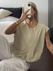 Chaleco sin mangas holgado para mujer, color beige sólido, cierre de cremallera y bolsillos con botones, estilo casual versátil, ideal para verano, uso diario, oficina, salidas informales y combinaciones con tops y pantalones casuales - Negro - Ver 9