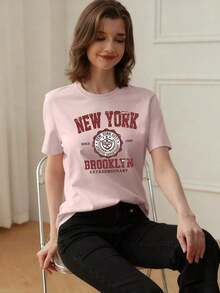 Camiseta de manga corta para mujer de corte holgado con cuello redondo y estampado de eslogan, nueva y casual para el verano, ropa de moda diaria y de vacaciones, adecuada para el día a día y las vacaciones. - Rosa Pálido - Ver 2