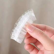 100 piezas Cubiertas de oído desechables y a prueba de agua, protectores de oído elásticos transparentes para ducha, baño, coloración del cabello, champú, protectores de oído a prueba de polvo y aceite para el hogar, salón de belleza y cuidado del cabello, talla única para la mayoría - Blanco - Ver 3