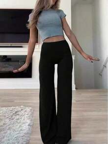 de pantalones anchos de yoga de unicolor y holgados para mujeres, cómodos y versátiles, adecuados para correr, fitness y deportes de yoga - Negro - Ver 10