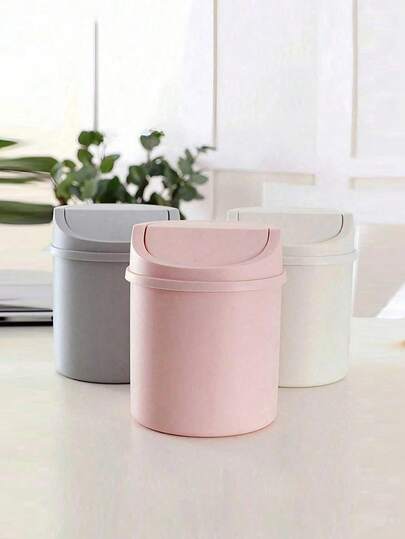 Minibasurero con tapa, papelera de escritorio pequeña, papelera de escritorio de plástico, diseño de tapa giratoria para evitar fugas de olores, adecuada para almacenar cáscaras de frutas y recortes de papel en el escritorio, mantiene el escritorio ordenado, aplicable al baño, oficina en casa, mesa de café, oficina, sala de estar, sala de estudio y otras ocasiones.