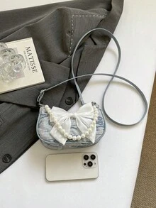 Tas selempang yang lucu dan serbaguna dengan pita dan resleting nilon berhiaskan mutiara, cocok untuk penggunaan sehari-hari. Dengan desain resleting dan tali bahu yang dapat disesuaikan, cocok untuk sekolah dan bepergian, dapat dengan mudah memuat kebutuhan sehari-hari. Barang multifungsi ini modis dan serbaguna, cocok untuk berbagai gaya dan kesempatan, dengan kemampuan adaptasi gaya yang kuat. - Biru - View 3