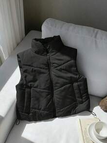 Chaleco acolchado corto para mujer color negro sólido, diseño de cierre frontal con cremallera, cuello alto, bolsillos laterales y cordón ajustable en el dobladillo, estilo cálido y casual, ideal para invierno, uso diario, actividades al aire libre, combinaciones con sudaderas, camisetas y jeans - Gris Claro - Ver 8