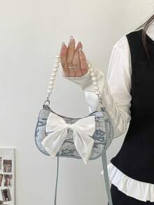 Tas selempang yang lucu dan serbaguna dengan pita dan resleting nilon berhiaskan mutiara, cocok untuk penggunaan sehari-hari. Dengan desain resleting dan tali bahu yang dapat disesuaikan, cocok untuk sekolah dan bepergian, dapat dengan mudah memuat kebutuhan sehari-hari. Barang multifungsi ini modis dan serbaguna, cocok untuk berbagai gaya dan kesempatan, dengan kemampuan adaptasi gaya yang kuat. - Biru - View 5