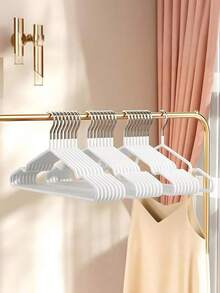 10er-Pack Kleiderbügel, robust und rutschfest, geeignet für den täglichen Gebrauch, langlebig, mit rutschfestem Design, ein modernes Accessoire für den Kleiderschrank. - Weiss - Übersicht 2