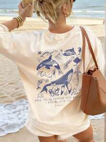 Women's Summer Short-Sleeved T-Shirt With A Casual Marine Animal Print Featuring Sharks, Dolphins, And Starfish. It Has A Round Neck, A Loose And Versatile Fit, And Is Beige In Color. Ideal For Everyday Wear And Vacations. Unisex. - 杏 - 查看 6