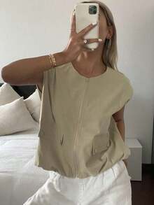Chaleco sin mangas holgado para mujer, color beige sólido, cierre de cremallera y bolsillos con botones, estilo casual versátil, ideal para verano, uso diario, oficina, salidas informales y combinaciones con tops y pantalones casuales - Negro - Ver 8