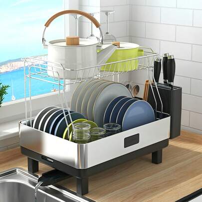 1pc Stainless Steel Dish Drying Rack, Large-Capacity Tableware Draining Holder And Dish Storage Shelf. Available In Double-Layer And Single-Layer Styles, It Can Serve As A Sink Draining Rack, Kitchen Storage Rack, Multi-Functional Dish Rack, Rust-Proof Storage Shelf And Drying Rack. Equipped With A Built-In Water Receiving Tray And Drainage Outlet For Smooth Water Drainage. Featuring A Sturdy And Durable Overall Structure, Space-Saving Design, Detachable Construction And Easy Cleaning, It Perfectly Fits All Kinds Of Kitchen Countertops. It Can Store Dinner Plates, Water Cups, Kitchen Accessories And Cooking Utensils. An Essential Item For Home Kitchens, It Is Also An Ideal Choice For Housewarming Gifts, Mother's Day Gifts, Father's Day Gifts And Various Holiday Presents.