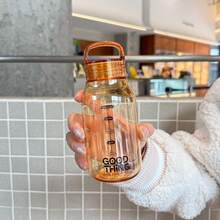 1個橘色透明刻度水瓶，330ml/620ml 塑料水杯附透明刻度與便攜手把，可愛輕巧可重複使用飲水瓶，適用於學校、辦公室、露營、旅行、戶外及日常飲水 - 橘色 - 查看 13
