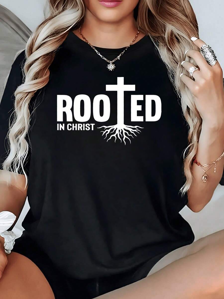 A Rising Cross Reveals Roots Symbolizing Deep Faith And Inner Strength Connected To The Spirit. A Stylish And Comfortable Modern Spiritual Message T-Shirt For Everyday Wear. - Black - View 1