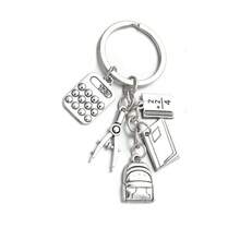1 chiếc móc khóa hình túi sách phong cách retro sáng tạo, phù hợp làm quà tặng cho bạn bè và bạn học. - Bạc - Xem 3