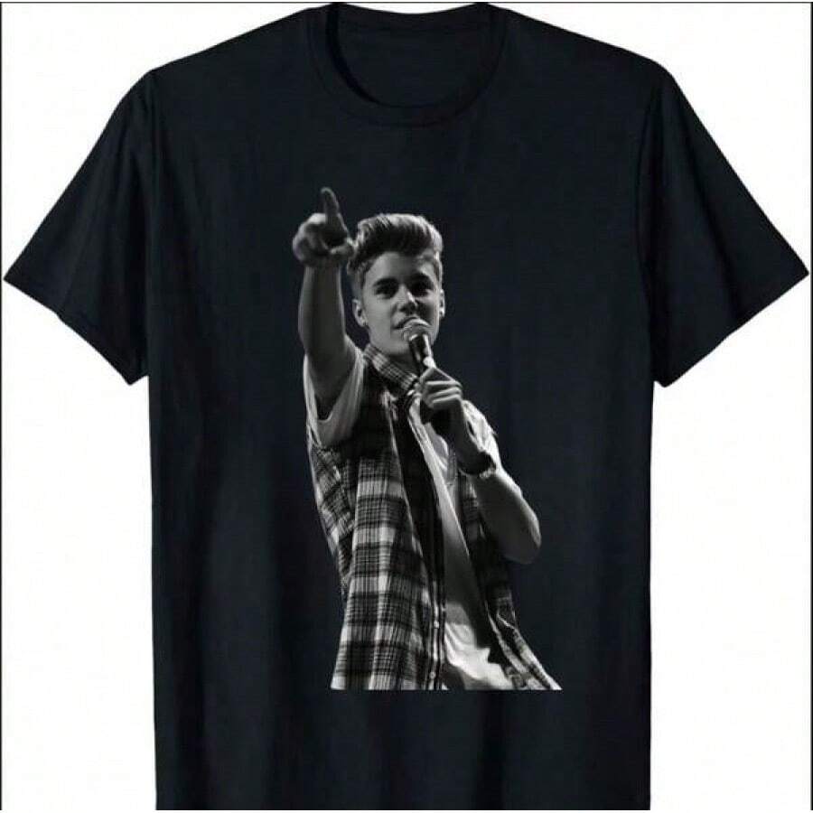 Merchandise T-Shirts, Exclusive Album Release Designs, Fan T-Shirts, Tour T-Shirts, Justin Album T-Shirts, Perfect For Everyday Wear. Casual Cotton T-Shirt, Soft, Light And Comfortable. Cotton Daytime Comfort, Stylish And Casual Design. Ideal For Men And Women. Crew Neck T-Shirt, Gym Top, Going Out Top, Outdoor Clothing, Holiday, Graduation, Fitted, Slogan T-Shirt. Quote T-Shirt, Minimalist Graphic T-Shirt, Funny Graphic Tee, Beach Party, Surfing, Picnic, Gift, Airport Outfit, Spring, Coordinates Sets. Women's Summer, Understated Summer Outfits, Summer Coordinates, Event Dresses, Autumn, Winter, All Seasons, Birthday Dress, Party Outfits, Rave Outfit, Office Wear. Women's Curvy, Casual Clothing For Women, Gym Wear. Women's Resort Style, Classic Unisex Graphic T-Shirt. RYAC - Black - View 1