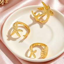 3件套金色海星贝壳戒指套装，海洋主题沙滩饰品，专为女性设计，时尚沙滩配饰，适合度假、生日和派对等场合。 - 金色 - 查看 5