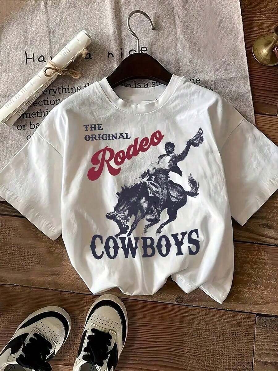 Short-Sleeved T-Shirt, Printed With A Design Of A Cowboy Riding A Horse, Combined With The Phrase "THE ORIGINAL Rodeo" And Cowboy Pants, Brown Leather Boots And A Cowboy Hat, Creating A Strong Western Cowboy Style. 100% Cotton - Putih - View 1