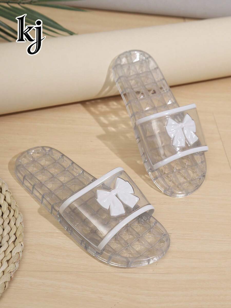 女士塑料拖鞋，防滑软底透明PVC蝴蝶结纯色露趾绑带平底凉鞋，甜美欧美风，适合夏季海滩、旅行、通勤、日常穿着，透明白色