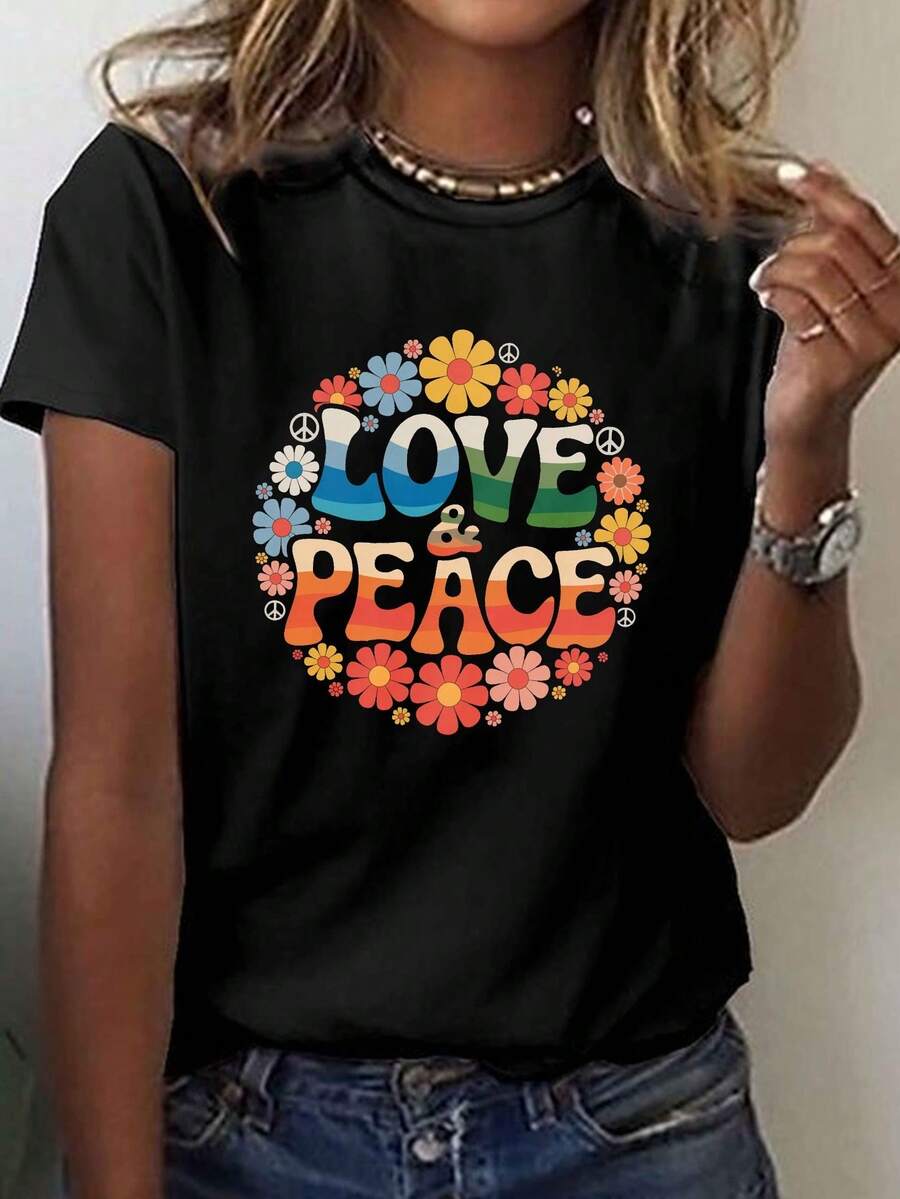 Camiseta Gráfica Estilo Hippie para Mujer con Estampado LOVE & PEACE - Manga Corta, Cuello Redondo, Estilo Casual con Vibrantes Símbolos Florales y de Paz, Tela de Elasticidad Media Lavable a Máquina para Verano y Primavera, Ropa de Uso Diario, Moda Retro, Material No Transparente - Negro - Ver 1
