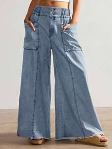 Versátiles y modernos, estos jeans cargo de pierna ancha combinan el estilo urbano con la comodidad que necesitas.El corte holgado favorece cualquier tipo de figura, mientras que los bolsillos laterales le dan un toque práctico y streetwear.El lavado claro es ideal para combinar con tops cortos, camisetas o sudaderas. - Azul lavado medio - Ver 11