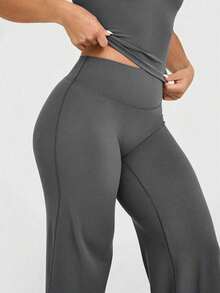 Estos pantalones anchos de yoga de unicolor son cómodos y estilizadores, adecuados para correr, hacer ejercicio y diversas actividades de yoga.Primavera - Gris - Ver 6