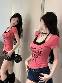 レディース 半袖 Tシャツ ホルターネック レイヤード風 トップス ショート丈 クロップド タイト スリム フィット リボン プリント 編み上げ風 フェイクレイヤード 重ね着風 地雷系 量産型 ギャル サブカル系 Y2K 着痩せ 細見え スタイルアップ デコルテ強調 ヘソ出し 腹チラ 夏服 韓国ファッション 個性的 セクシー ガーリー 可愛い デート イベント フェス ライブ お出かけ ピンク ブラック カットソー ドッキング 美シルエット 伸縮性 アシンメトリー - ピンク - チェックする 2