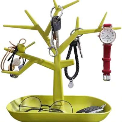 Giá treo trang sức và chìa khóa hình cây OULIGET giúp bạn sắp xếp gọn gàng các phụ kiện hàng ngày. Sản phẩm có nhiều móc hình nhánh cây để treo vòng cổ, bông tai, nhẫn và chìa khóa mà không bị rối. Khay đựng đồ phía dưới rất lý tưởng để đựng đồng hồ, nhẫn, tiền xu và các vật dụng nhỏ khác. Thiết kế thẳng đứng ổn định giúp tiết kiệm không gian trên bàn làm việc và tạo thêm phong cách trang trí thanh lịch cho ngôi nhà. Lý tưởng để sử dụng ở lối vào, bàn trang điểm, phòng ngủ và bàn làm việc văn phòng.