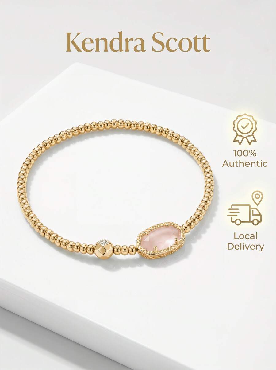 Kendra Scott 这款格雷森玫瑰石英金色弹力手链,以其标志性的宝石形状和恰到好处的闪耀光泽,轻松融入您的日常叠戴造型——我们相信您也会爱上它。最棒的是,它的设计适合任何手腕尺寸。未拉伸周长 6.5 英寸。链节尺寸:长 0.41 英寸 x 宽 0.22 英寸。 - 金色 - 查看 1