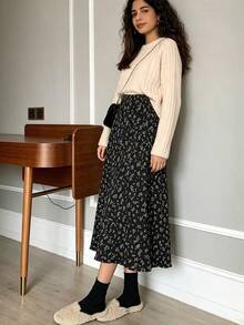 Falda de falda a medio largo con estampado floral para mujer, nuevo modelo de verano, de cintura alta, versátil, informal, ideal para el día a día y para las vacaciones - Negro - Ver 2