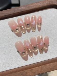 Bộ 10 móng tay giả dài hình bầu dục, màu hồng nude, kiểu dáng thanh lịch, họa tiết bướm, lá vàng, đá lấp lánh, thích hợp cho bé gái, phụ nữ, sử dụng hàng ngày, đi làm, đi học, hẹn hò, dự tiệc, dạ hội, quà tặng Valentine. - Hồng - Xem 1