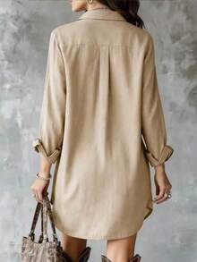 Đầm sơ mi dài tay màu mơ dành cho nữ, chất liệu polyester, cài cúc, cổ áo, thiết kế ngắn phía trước, dài phía sau, có túi. - Màu be - Xem 2