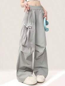 Pantalones casuales de estilo urbano para mujer con lazo de diseño, en color gris, nuevos para el verano, de cintura alta elástica y corte ancho - Gris - Ver 1