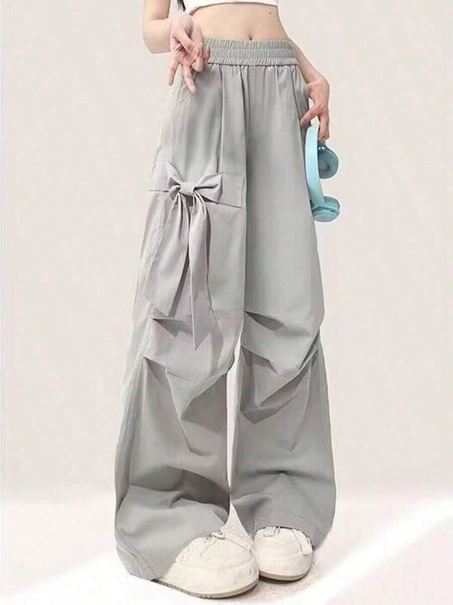 Pantalones casuales de estilo urbano para mujer con lazo de diseño, en color gris, nuevos para el verano, de cintura alta elástica y corte ancho - Gris - Ver 1