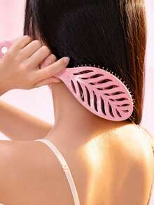 Lược chải tóc chống rối hình lá, có răng lược uốn xoăn bên hông, lược tạo kiểu thông thoáng, lược chải tóc thiết kế hình lá rỗng giúp làm mượt tóc và tạo kiểu tóc xoăn. - Nhiều màu - Xem 2