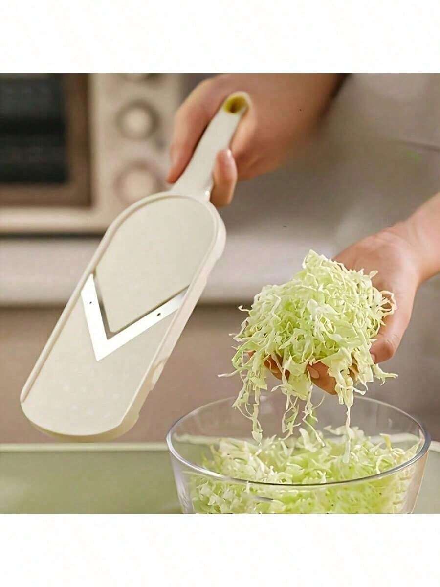 1件装实用纯色多功能蔬菜削皮切片器，采用耐用塑料制成，配有符合人体工程学的防滑手柄，适用于卷心菜、胡萝卜和各种蔬菜沙拉的制作，易于清洁的厨房工具，是送给女性、家人、新年、情人节、母亲节、父亲节、毕业典礼的理想礼物。