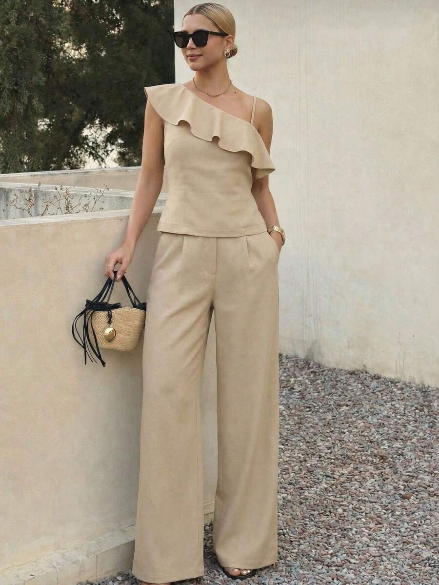 A&DD FASHION, Reference Number: Y493 - Set, Women's Two-Piece Suits, High-Waisted Wide-Leg Pants, Trousers, Camisole, Crop Top, Ruffled Hem Design, Comfortable To Wear, Sophisticated Look, High Quality, Stylish Look, Versatile, Elegant Style, Two-Piece Suits, Casual Chic Look, Comfortable And Stylish, Pants With Pockets, Elegant Suits, Perfect For Spring And Summer, Blogger Style, Casual And Formal, Suitable For All Occasions, Elegant And Fashionable, Feminine Look, Summer 2025 Collection. - 淺米色 - 查看 1