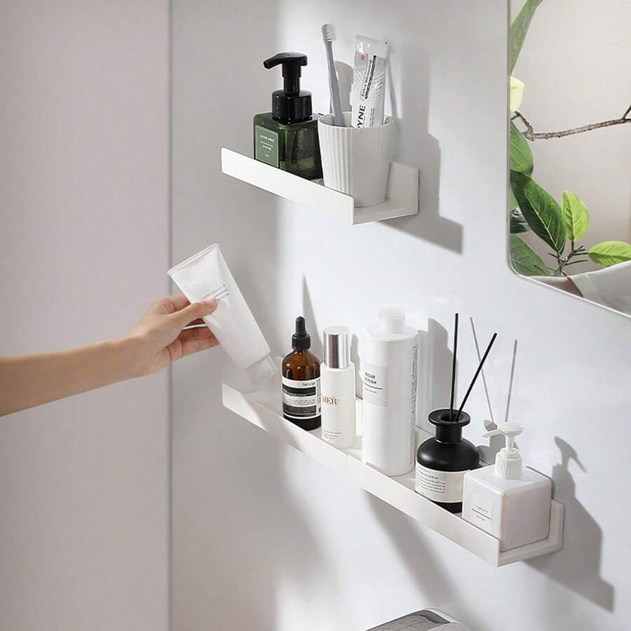 1 Kệ treo tường không cần khoan màu trắng (có keo dán chắc chắn) - Được làm từ nhựa dày dặn, kiểu dáng hiện đại và đơn giản, tiết kiệm không gian, dễ dàng lắp đặt và tháo gỡ, không để lại dấu vết.