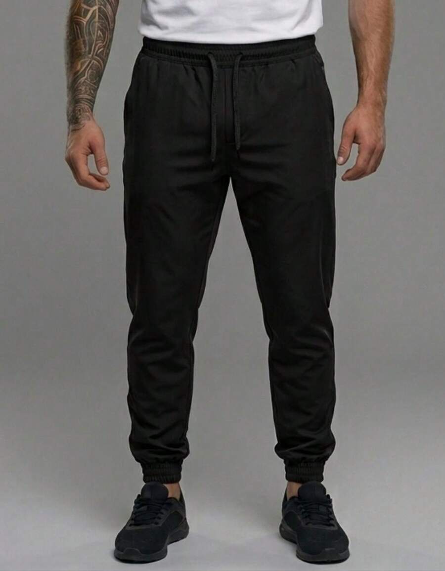 Calça Lisa com Elastano Masculina com Bolso Frontal, Confortável, Ajuste Perfeito e Estilo Casual para Dia a Dia - Preto - Visão 1
