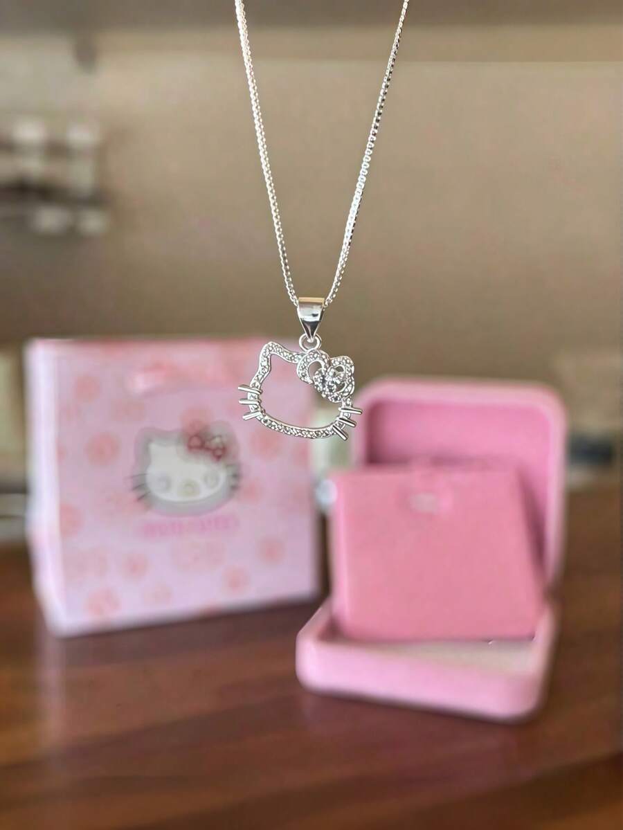 1 chiếc vòng cổ mặt dây chuyền hình nơ Hello Kitty dễ thương của Sanrio, món quà ngọt ngào và đáng yêu dành cho bạn thân.