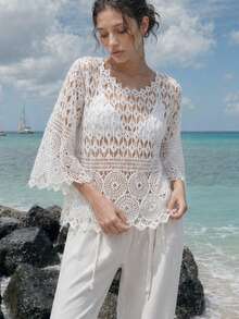 Áo kiểu ren móc sang trọng màu trắng kiểu Bohemian, thích hợp cho kỳ nghỉ hè ở bãi biển và các bữa tiệc. Áo sơ mi tay lửng khoét rỗng thời trang, phù hợp với trang phục thường ngày mùa xuân. - trắng - Xem 2
