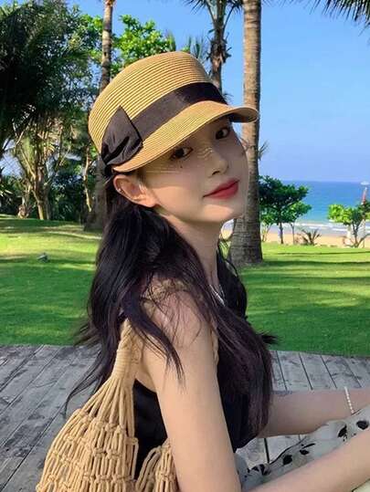 1 chiếc mũ chống nắng du lịch ngoài trời đa năng thời trang dành cho nữ, thiết kế nơ, kiểu mũ xô, vành rộng giúp khuôn mặt trông nhỏ hơn.