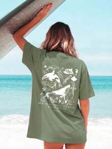 Women's Summer Short-Sleeved T-Shirt With A Casual Marine Animal Print Featuring Sharks, Dolphins, And Starfish. It Has A Round Neck, A Loose And Versatile Fit, And Is Beige In Color. Ideal For Everyday Wear And Vacations. Unisex. - 草綠色 - 查看 5