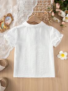 Camisa blanca con textura y botones delanteros, cuello Peter Pan y mangas cortas con volantes para niñas, adecuada para volver a la escuela, fiestas y uso diario en el campus - Blanco - Ver 2