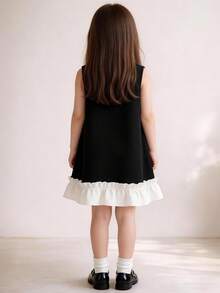 Đầm thanh lịch cho bé gái 4-8 tuổi - Đầm chữ A không tay màu đen với nơ trắng đính kèm và viền bèo nhún | Thích hợp cho tiệc tùng, đám cưới hoặc các dịp đặc biệt - màu đen - Xem 2