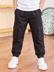1pc 4-7 Years Old Young Boys' Solid Color Jogger Pants, Soft & Comfortable With Pockets, Classic Style Casual Trousers For All Seasons - Black - View 1